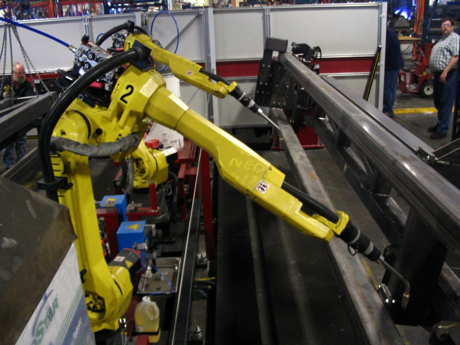 Industrial robot arm on an automated production line