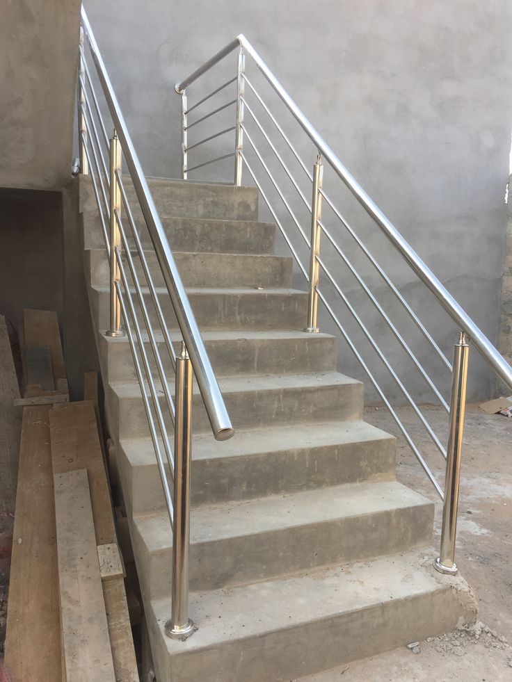 External stainless balustrade on concrete steps