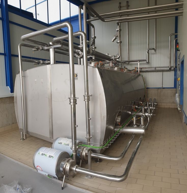 Stainless process tank with pumps and pipework installed by Heffmech
